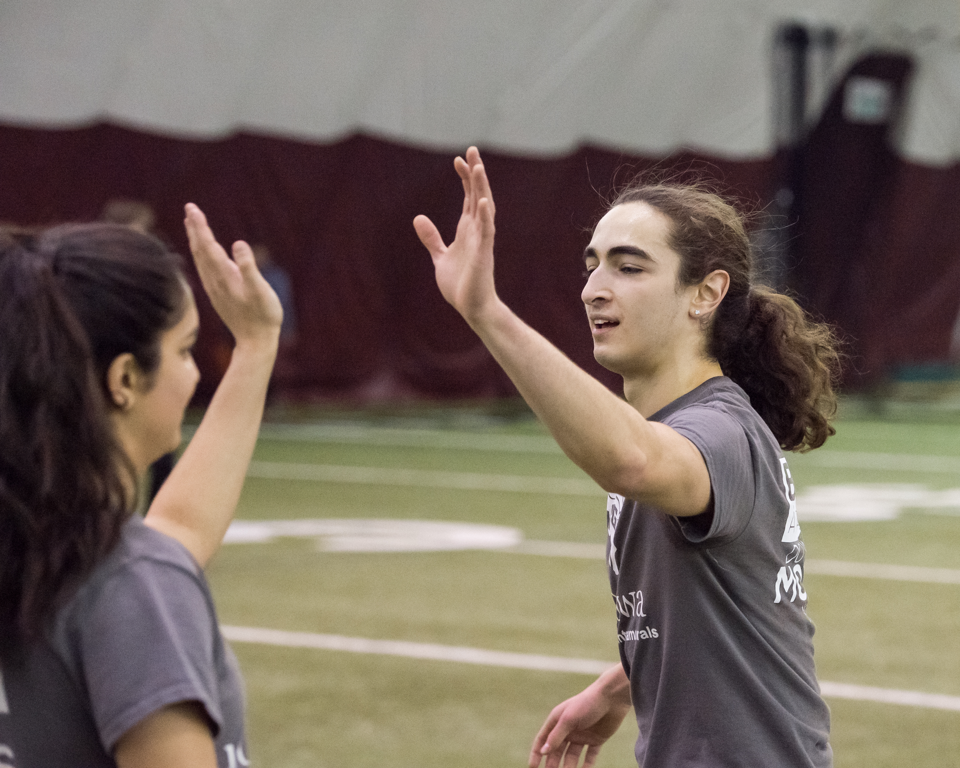 Teammates high-fiving
